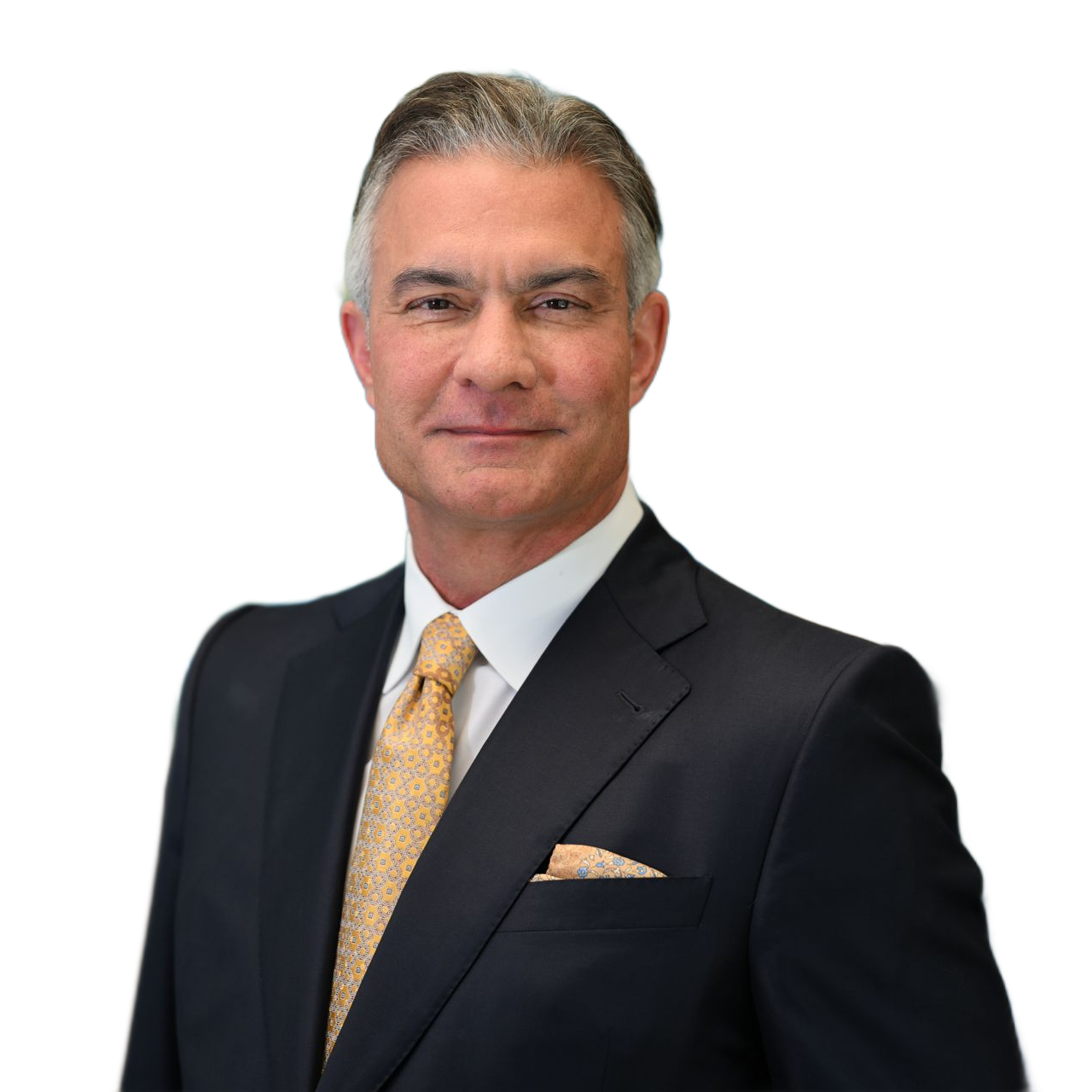 Man in a dark suit with gold tie, smiling.