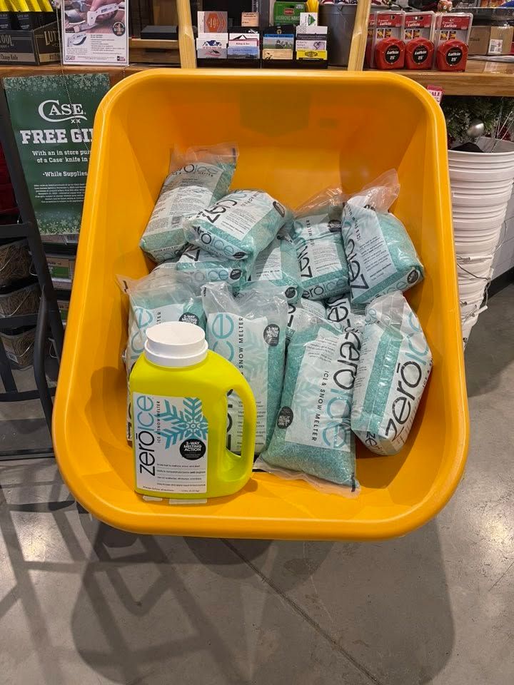 Yellow bin of bottled detergent and wrapped soap bars in a store aisle