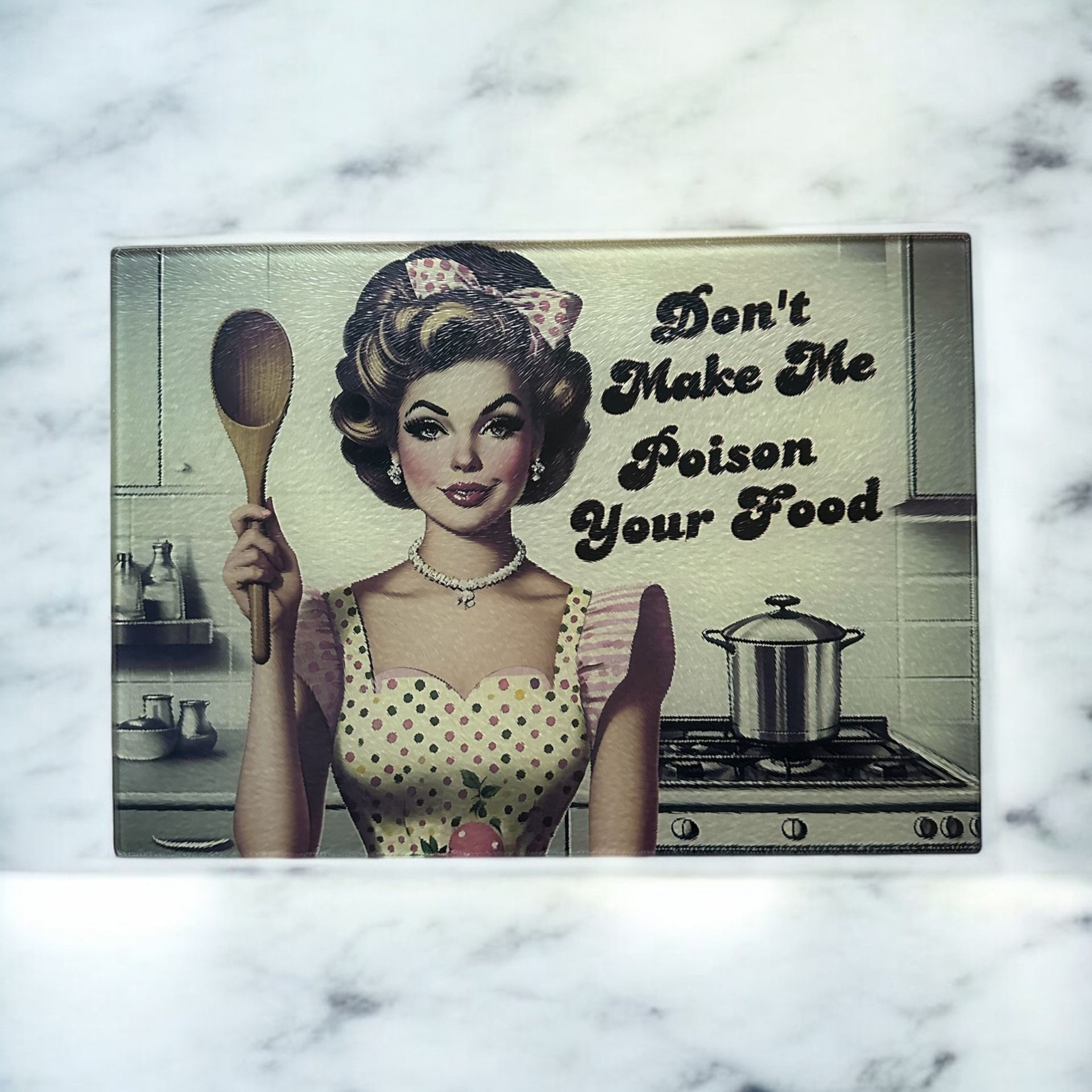 A rectangular sign features a retro-style illustration of a person holding a wooden spoon, text reads 
