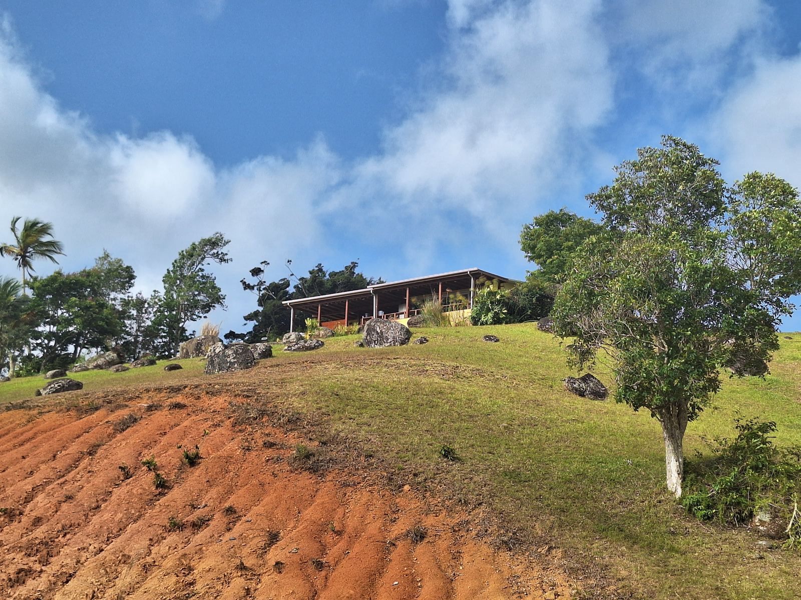 Front of the main residence on its hilltop, with the deck facing the valley
