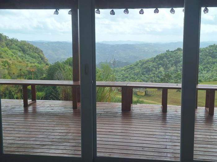 Deck and valley seen from inside the main residence