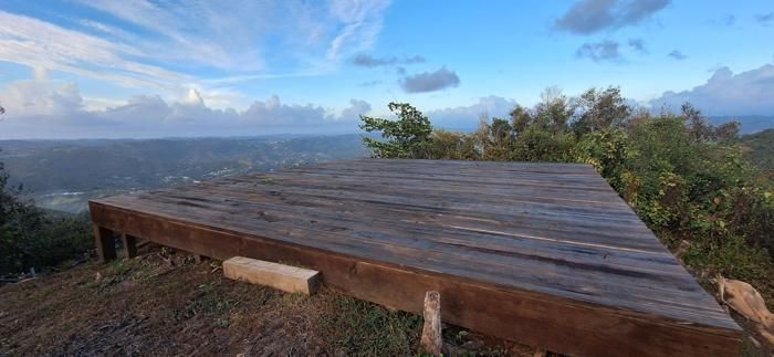 Wooden lookout platform at the highest point of the property