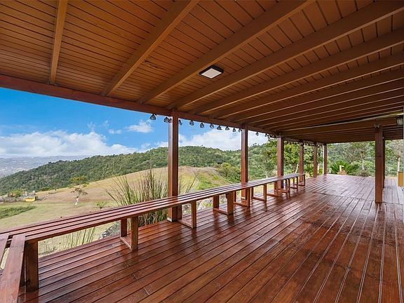 Deck with built-in benches and mountain views