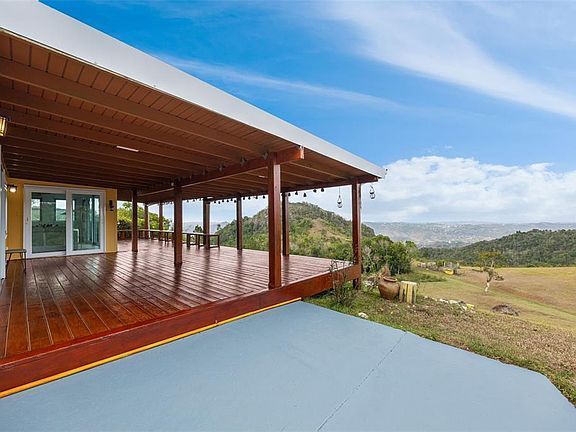 Deck corner and the valley beyond the roofline