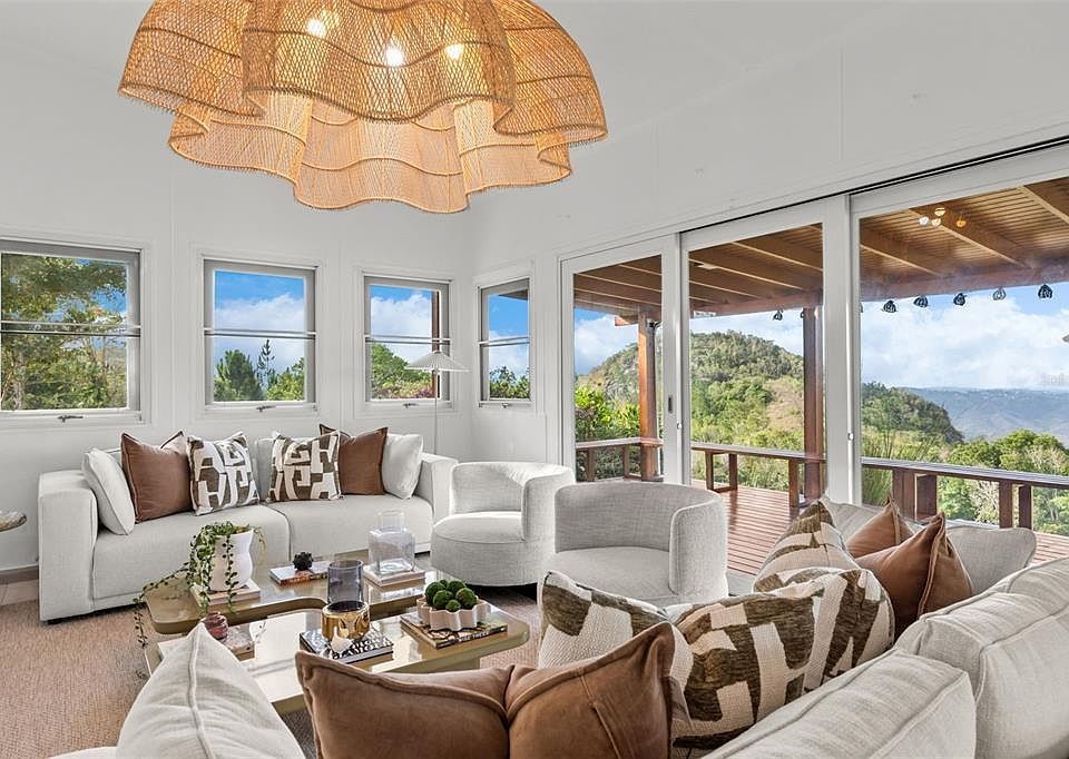 Living room seating beside the sliding glass doors