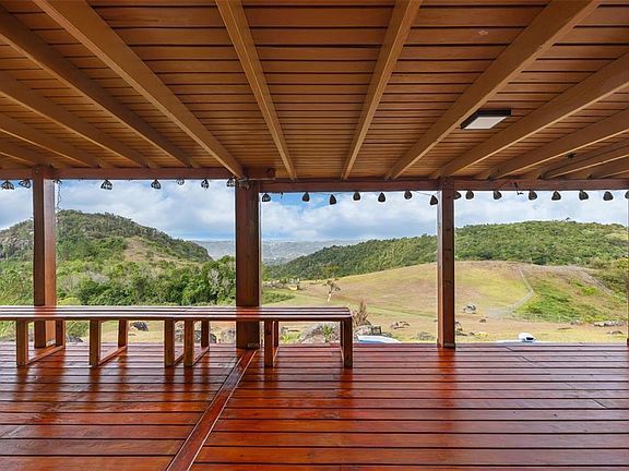 Deck seating area with pasture views