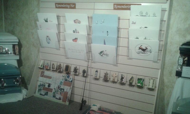 A wall with a bunch of papers hanging on it
