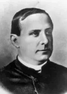 A black-and-white portrait of a man in clerical attire, looking toward the right.