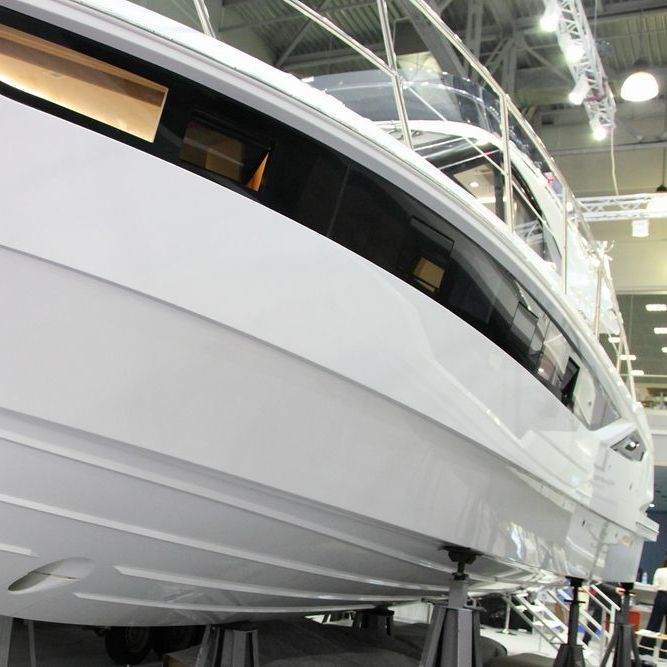 Modern powerful motor boat bottom with bow thruster steering hole and redans