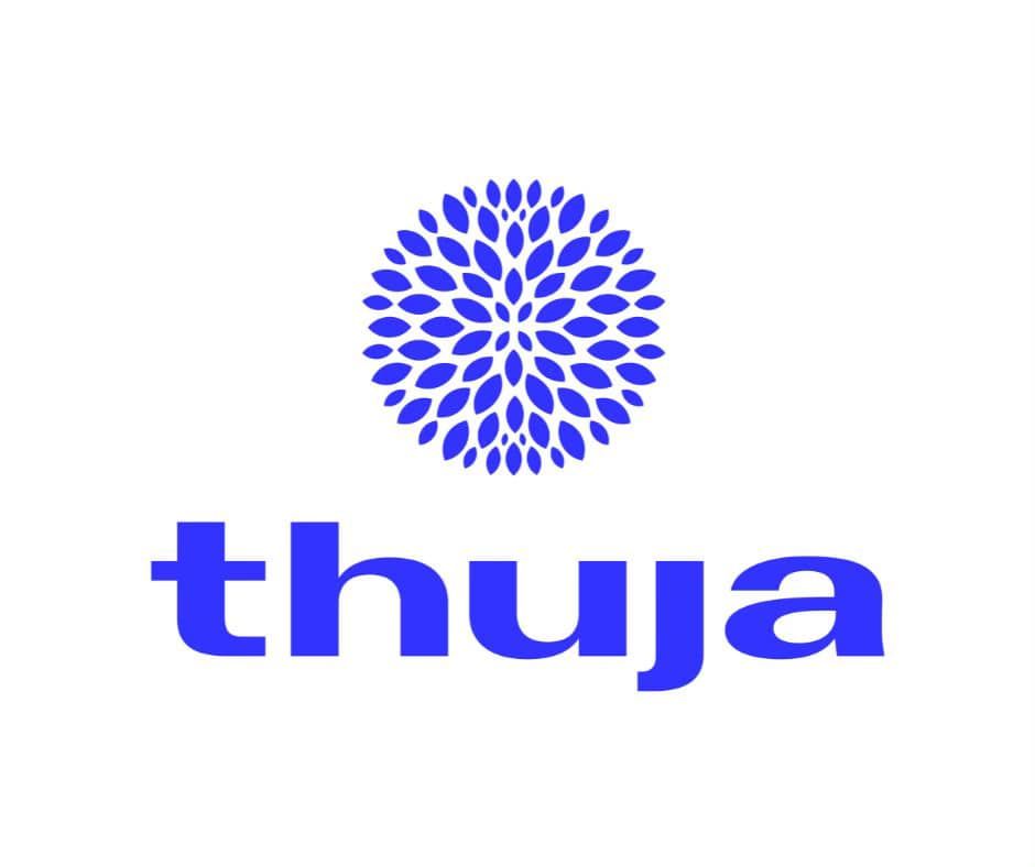 A blue, circular floral-patterned logo above the word 