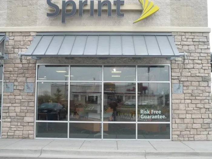 Sprint storefront with stone facade and glass windows