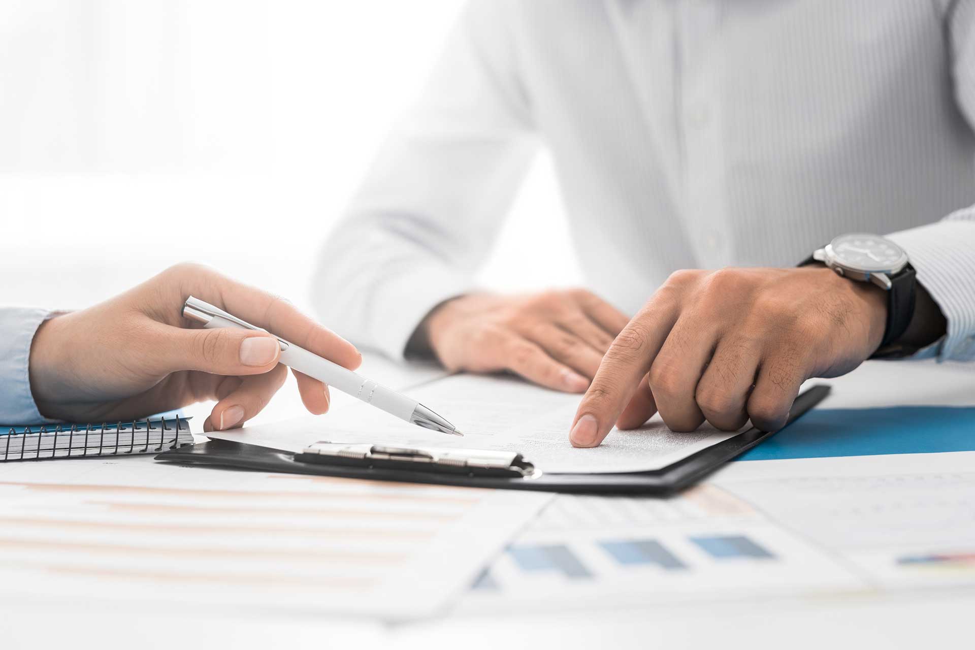 Local Probate Lawyer Discussing Documents With Client