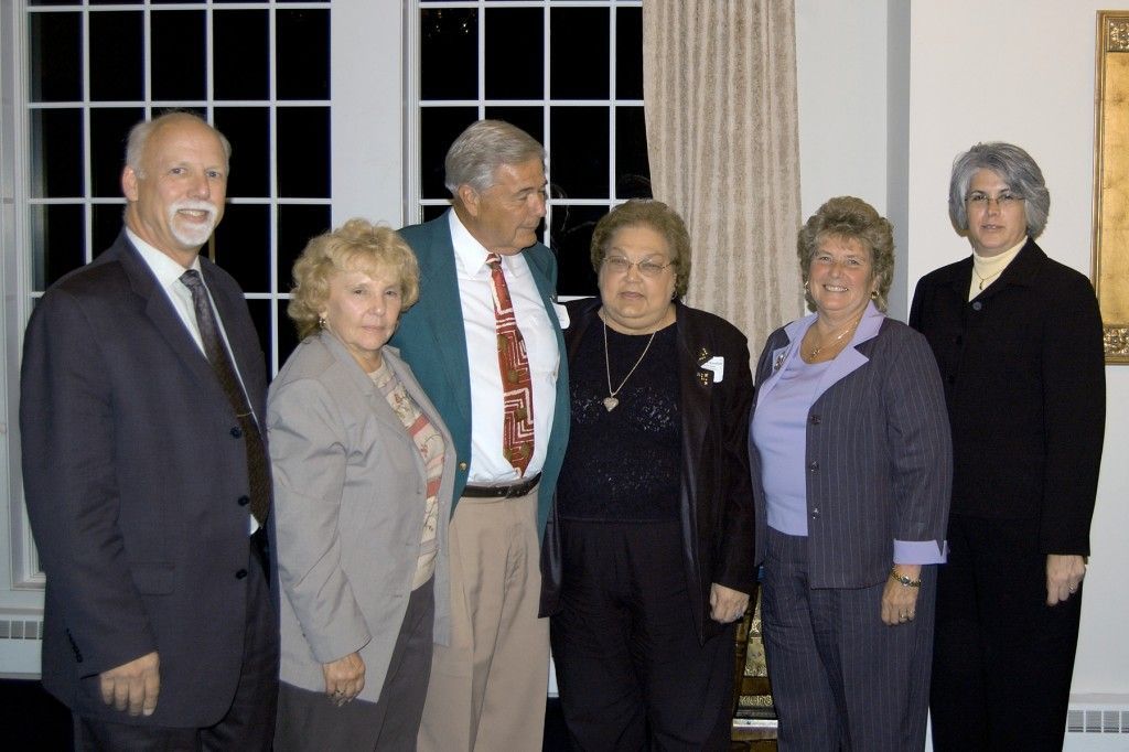 A group of elders are posing for a picture together.