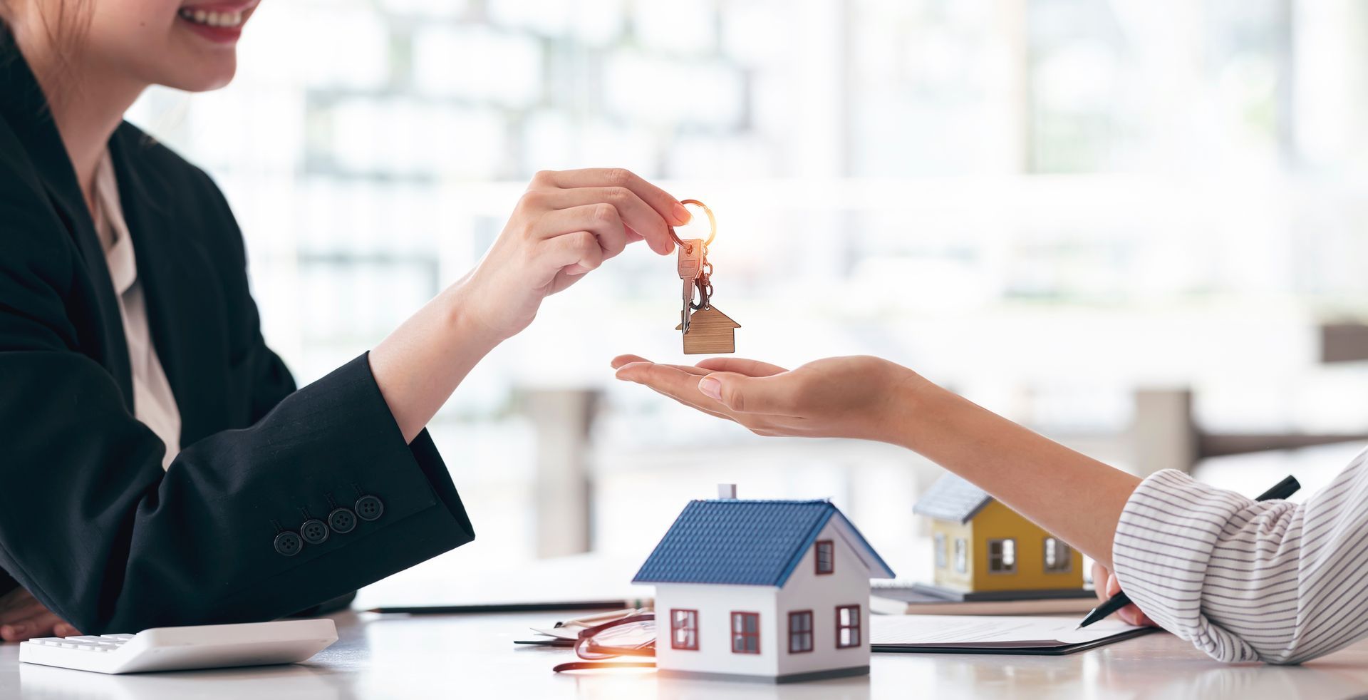 Real estate agent or realtor meeting with her client.