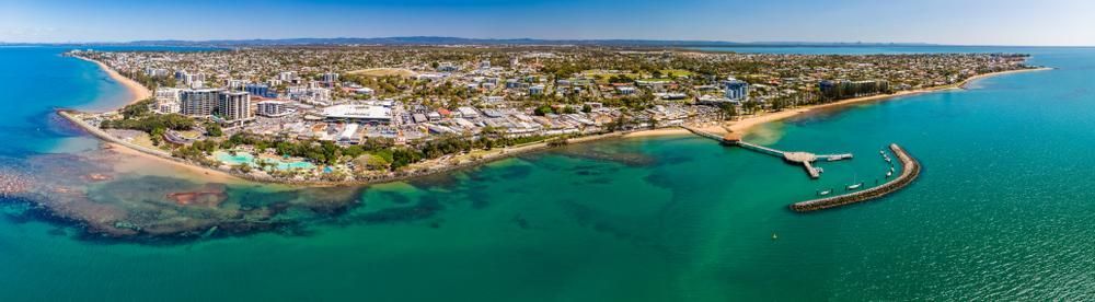 An Aerial View of a Small Island in the Middle of the Ocean — Coastal Auto Doors & Gates In Nambour, QLD