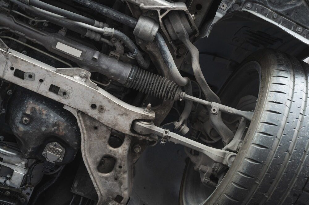 Undercarriage of a Vehicle, Showing Suspension Components, Tires, and Steering — Burcher EFI & Service Centre in Orange, NSW