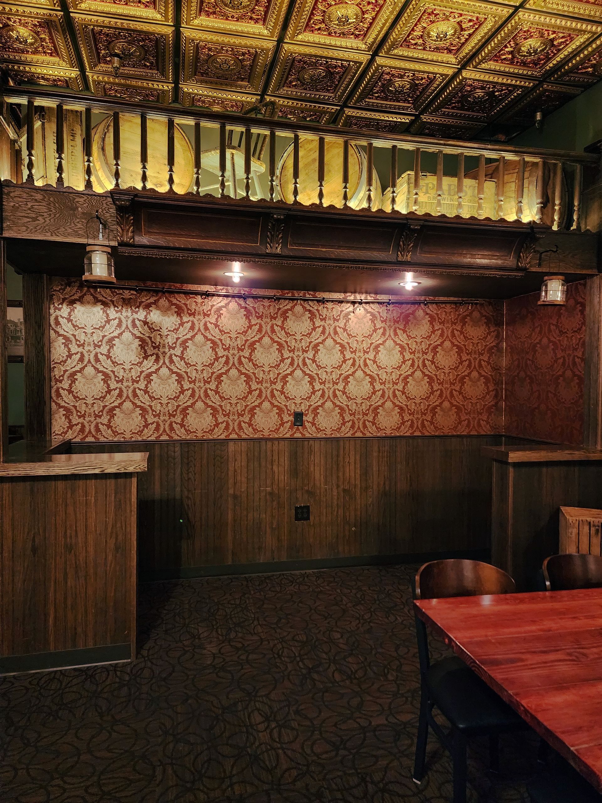 An empty room with a table and chairs in it