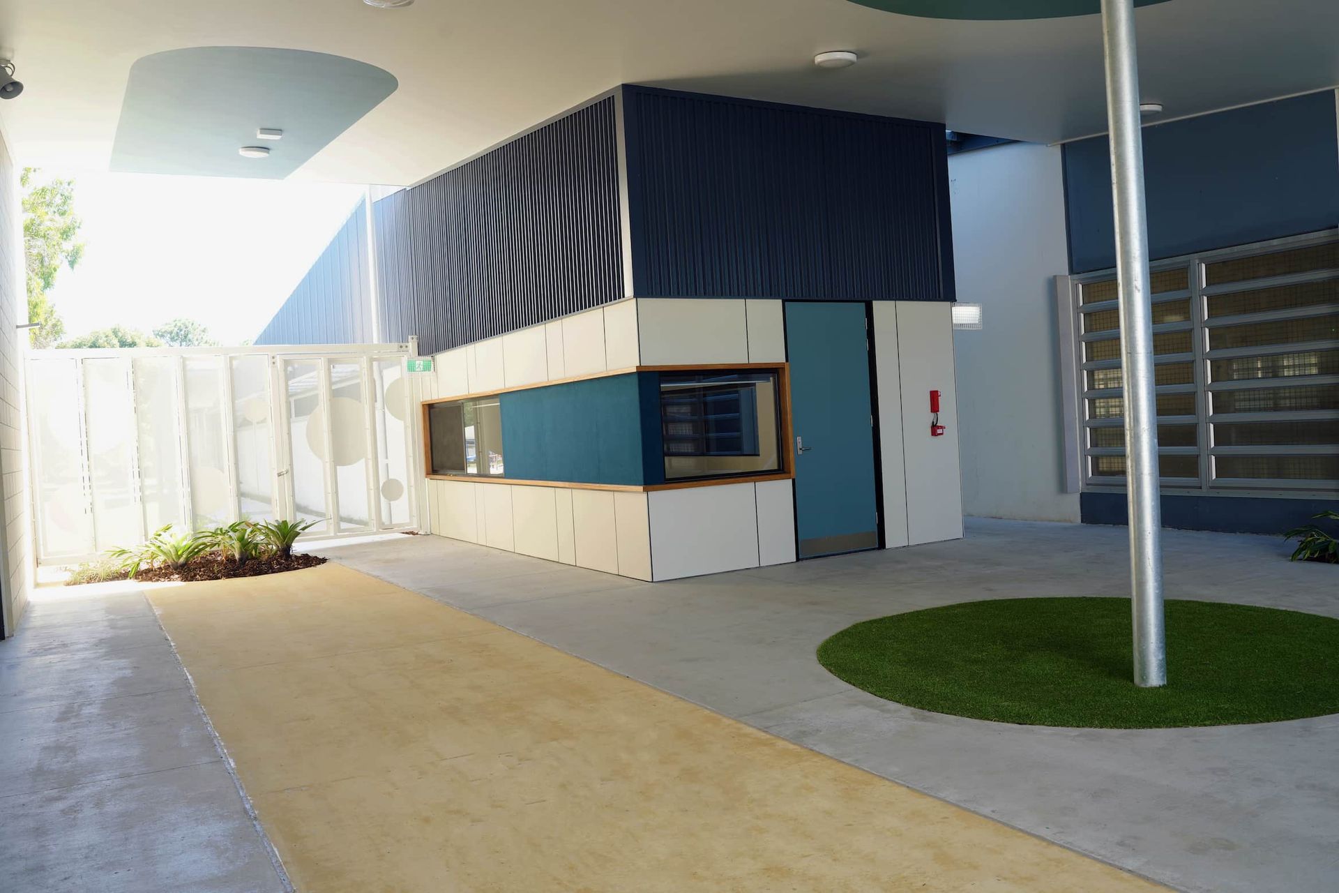 a building with a blue door and a window