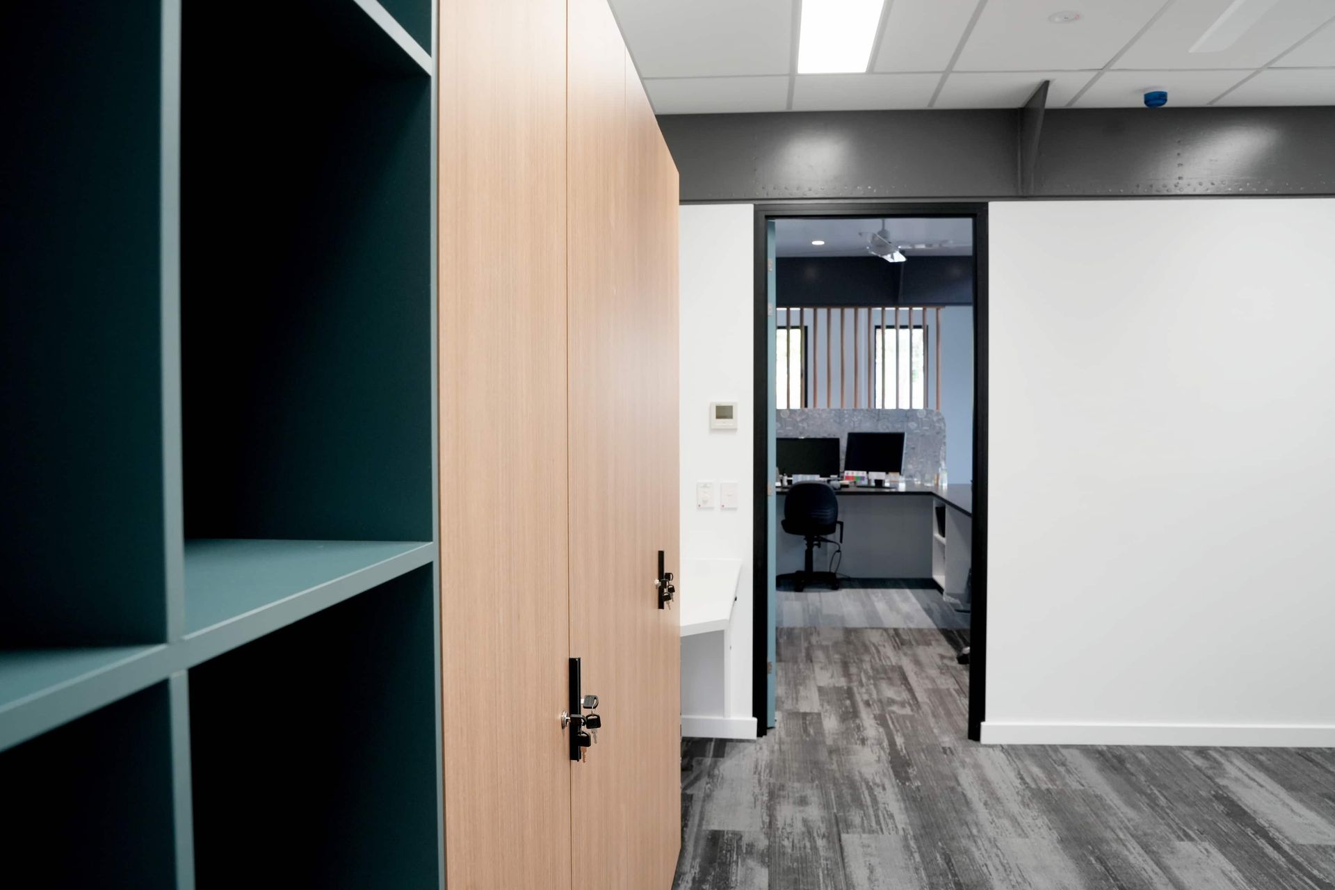 there is a doorway leading to a room with a desk and a computer at Shailer Park SHS Health Hub