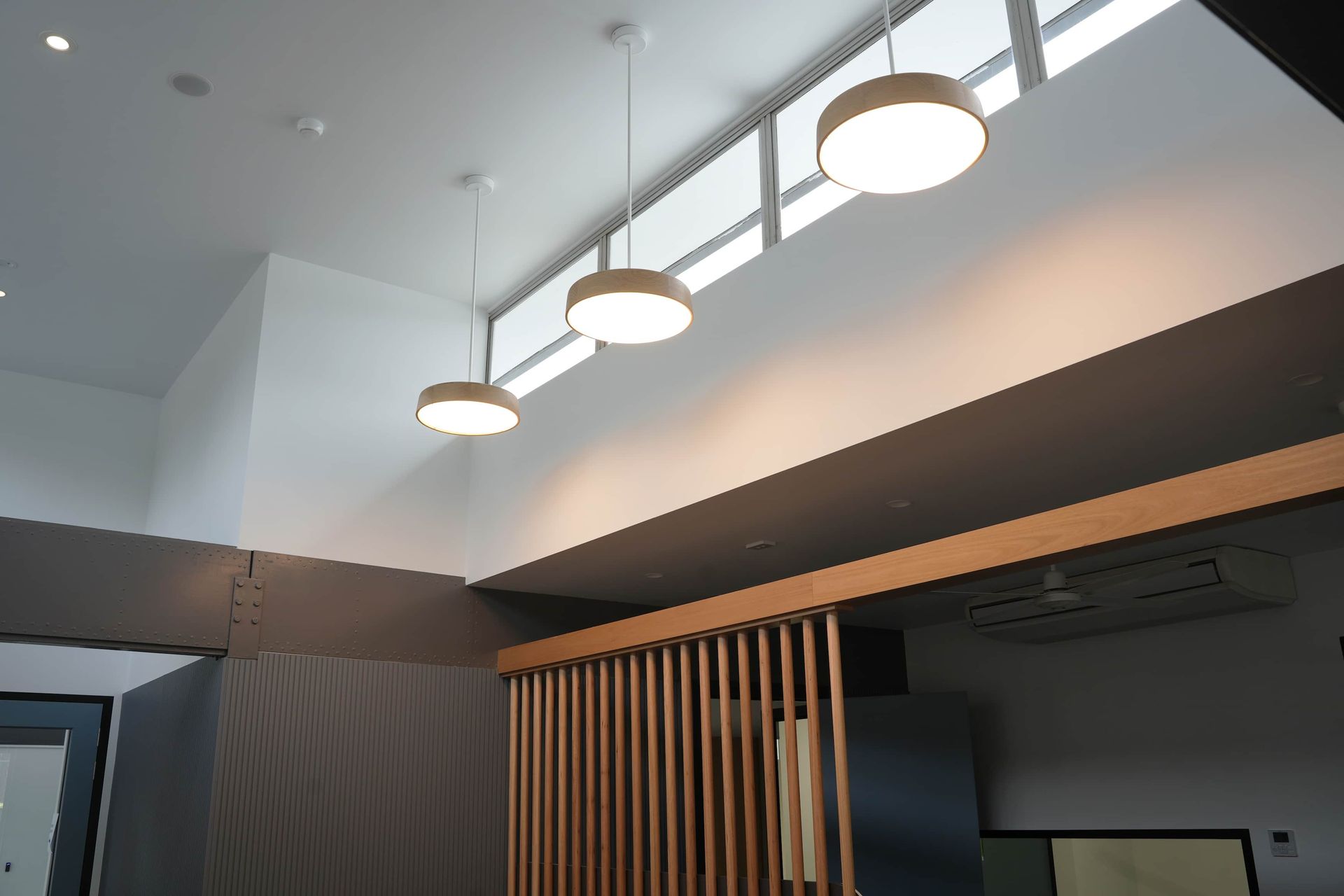 a row of lights hanging from the ceiling of a room at Shailer Park SHS Health Hub