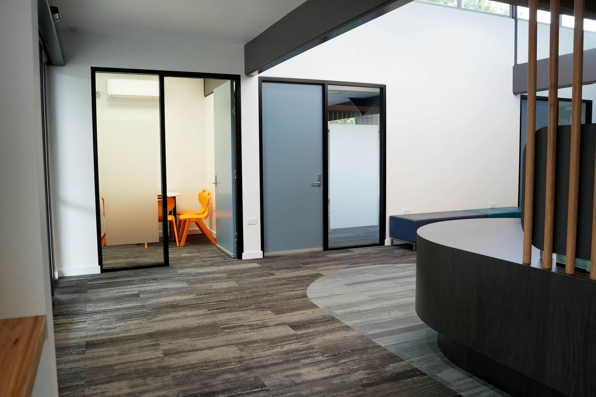 a room at Shailer Park SHS Health Hub with a table and chairs in it and a sliding glass door 