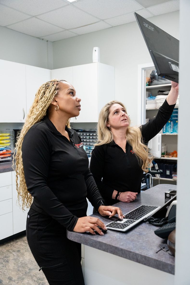 DentCate staff in a workstation at DentCare Now, emergency dentist serving Fairfax, VA