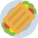 Overhead view of a sandwich with lettuce and tomato on a light blue plate