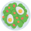 Top view of a green salad with eggs and tomato pieces