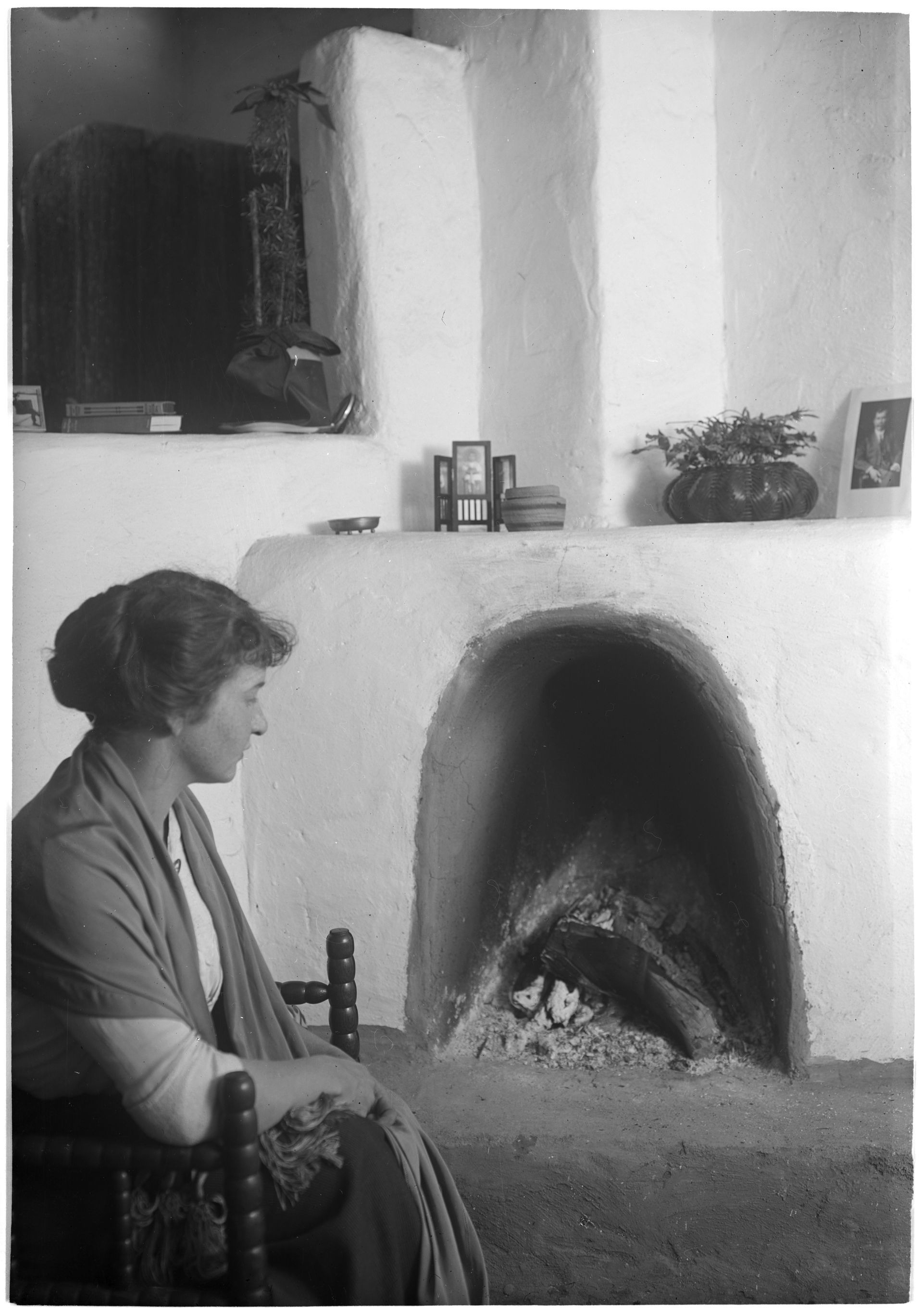 Beside the fireplace