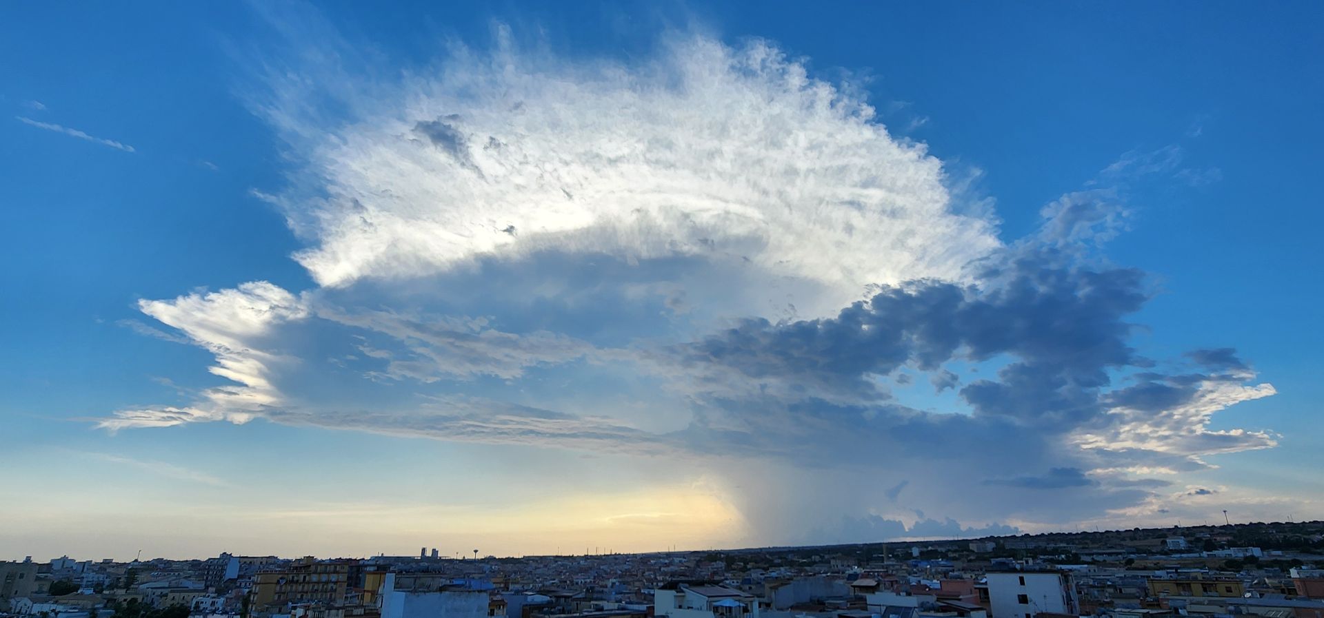 An enormous thunderhead to our west, just before sunset, somewhere near Santa Croce Camerina