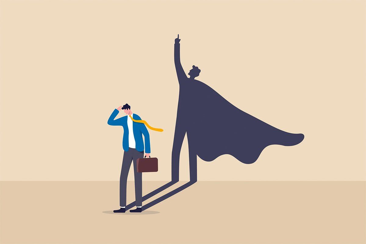 Cartoon of man with superhero shadow