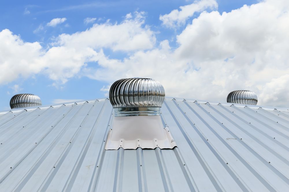 Roof with whirly bird — Qualified Roofer in Canberra