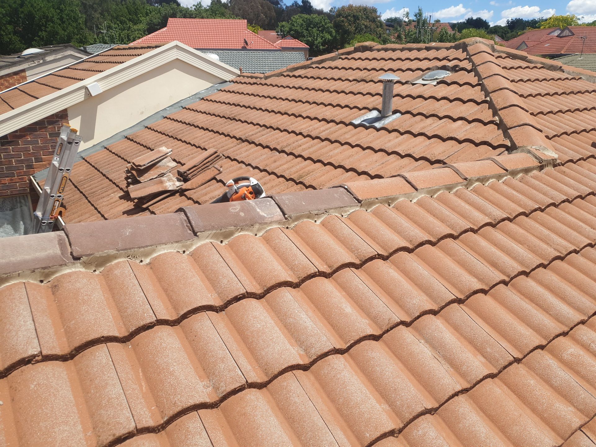 Roofer with client — Qualified Roofer in Canberra