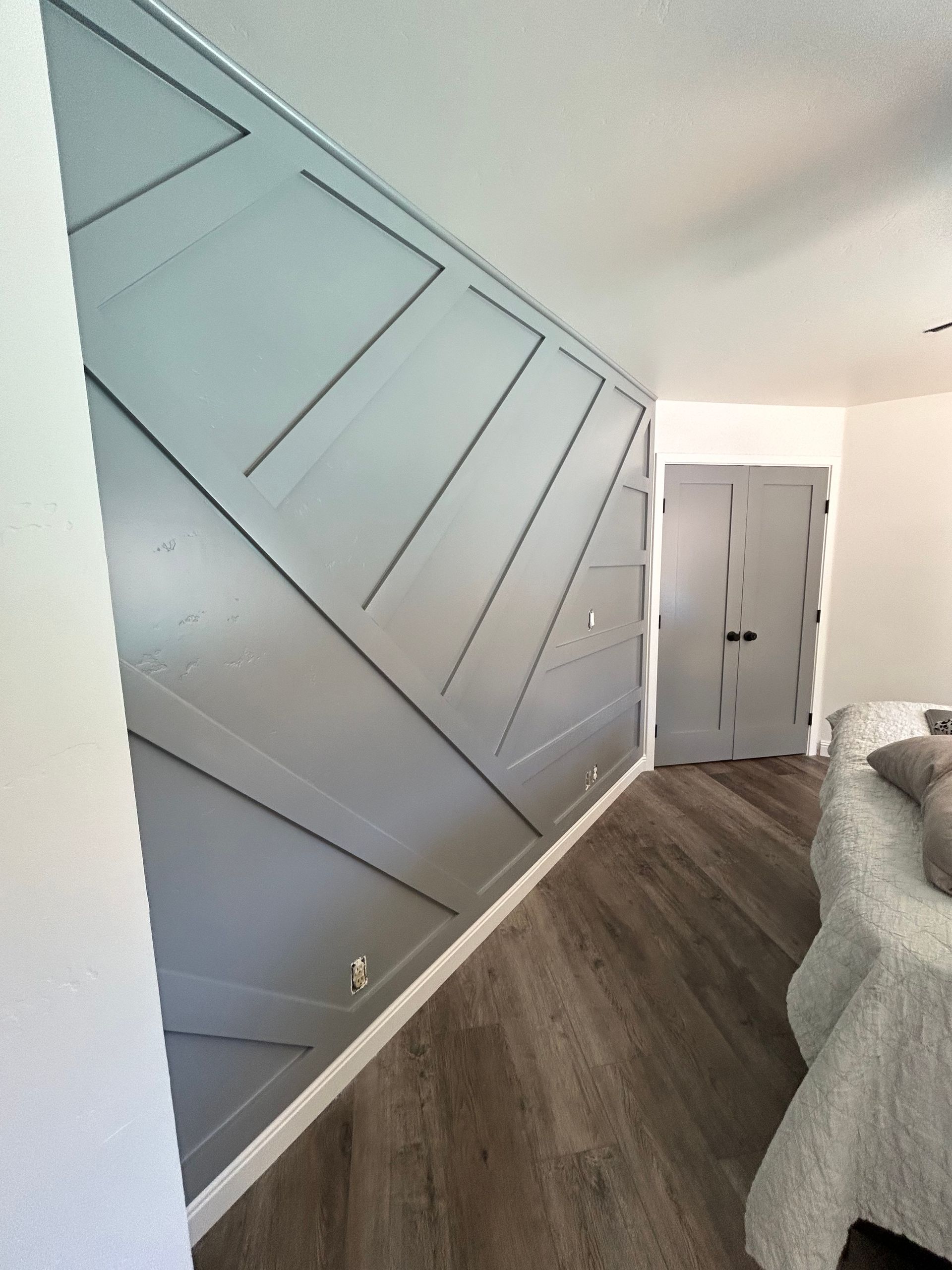 A living room with a fireplace and a ladder