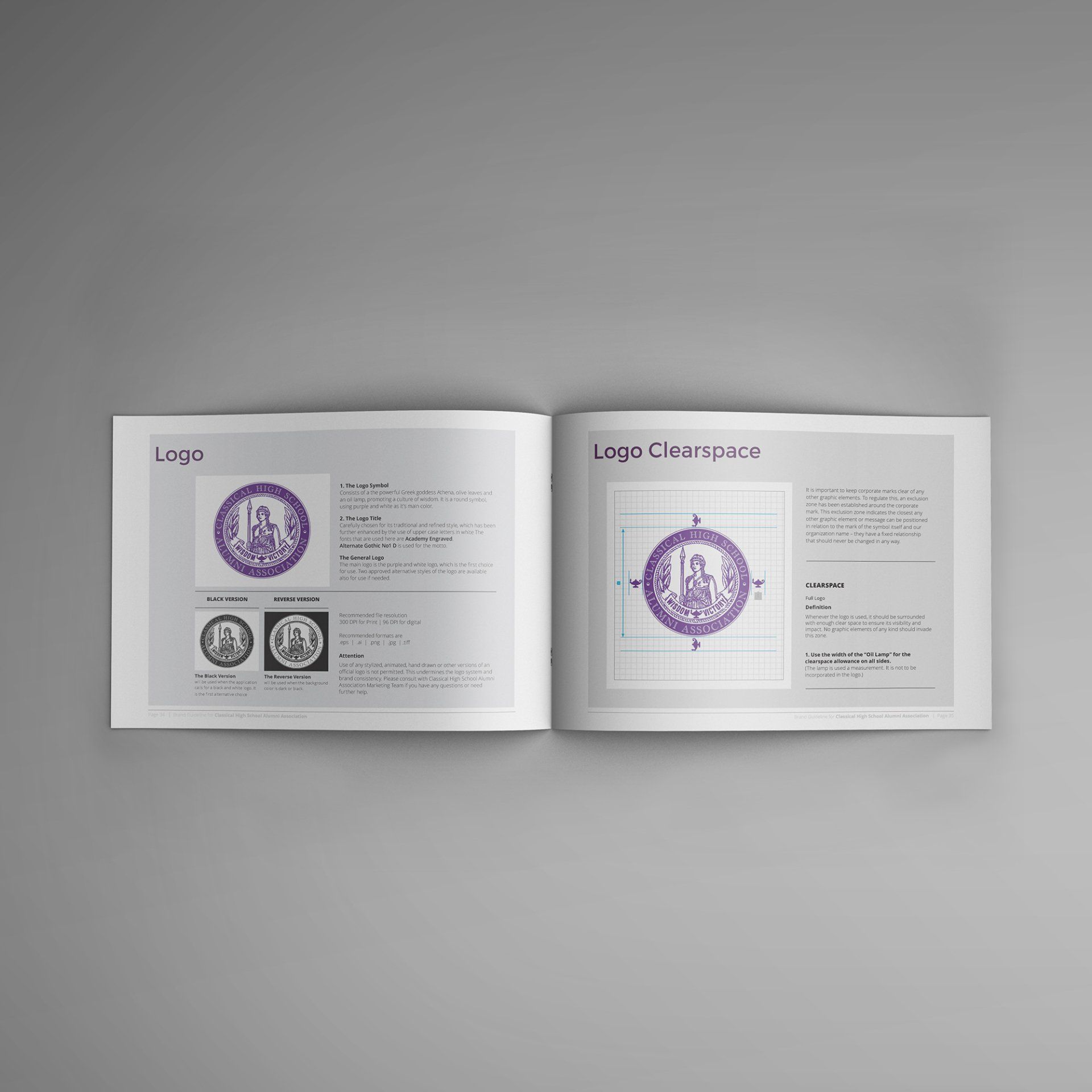 A book is open to a page with a purple logo on it