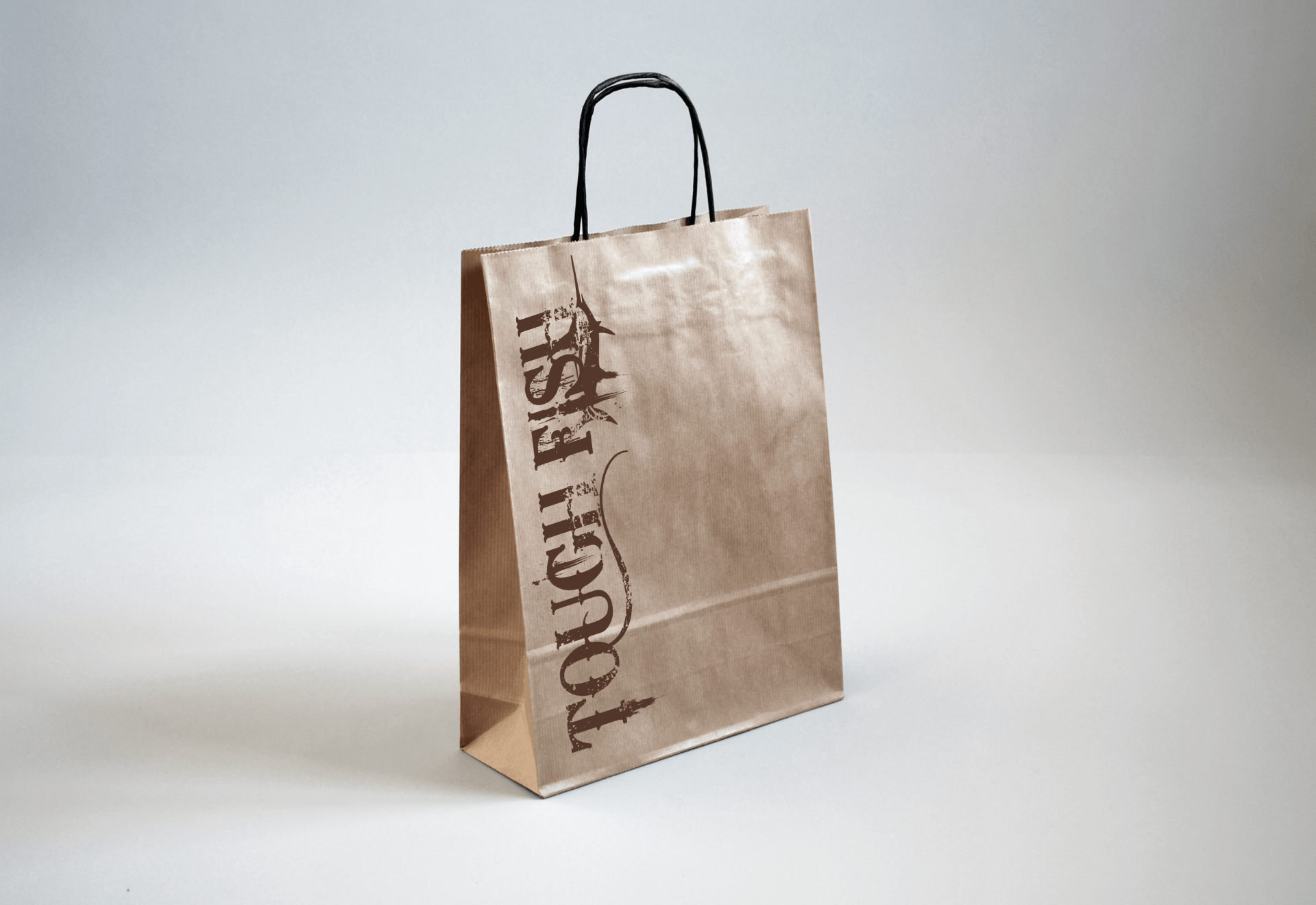 A brown paper bag with the word tough fish on it