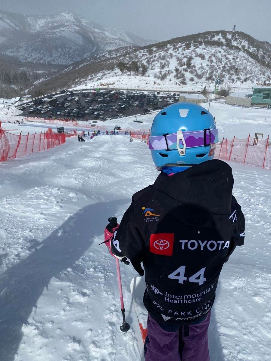 FAS athlete in action spinning off of a rail feature at PCM