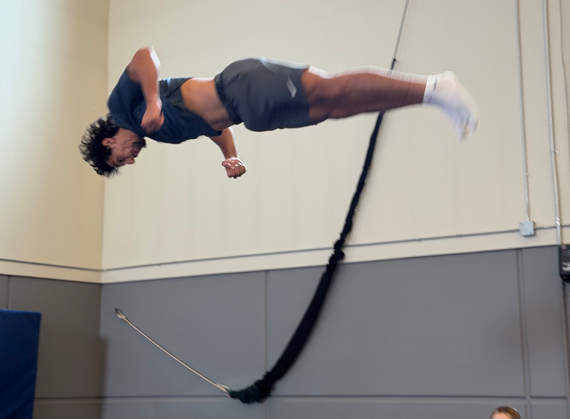 Aerial athlete having some fun at the end of their session