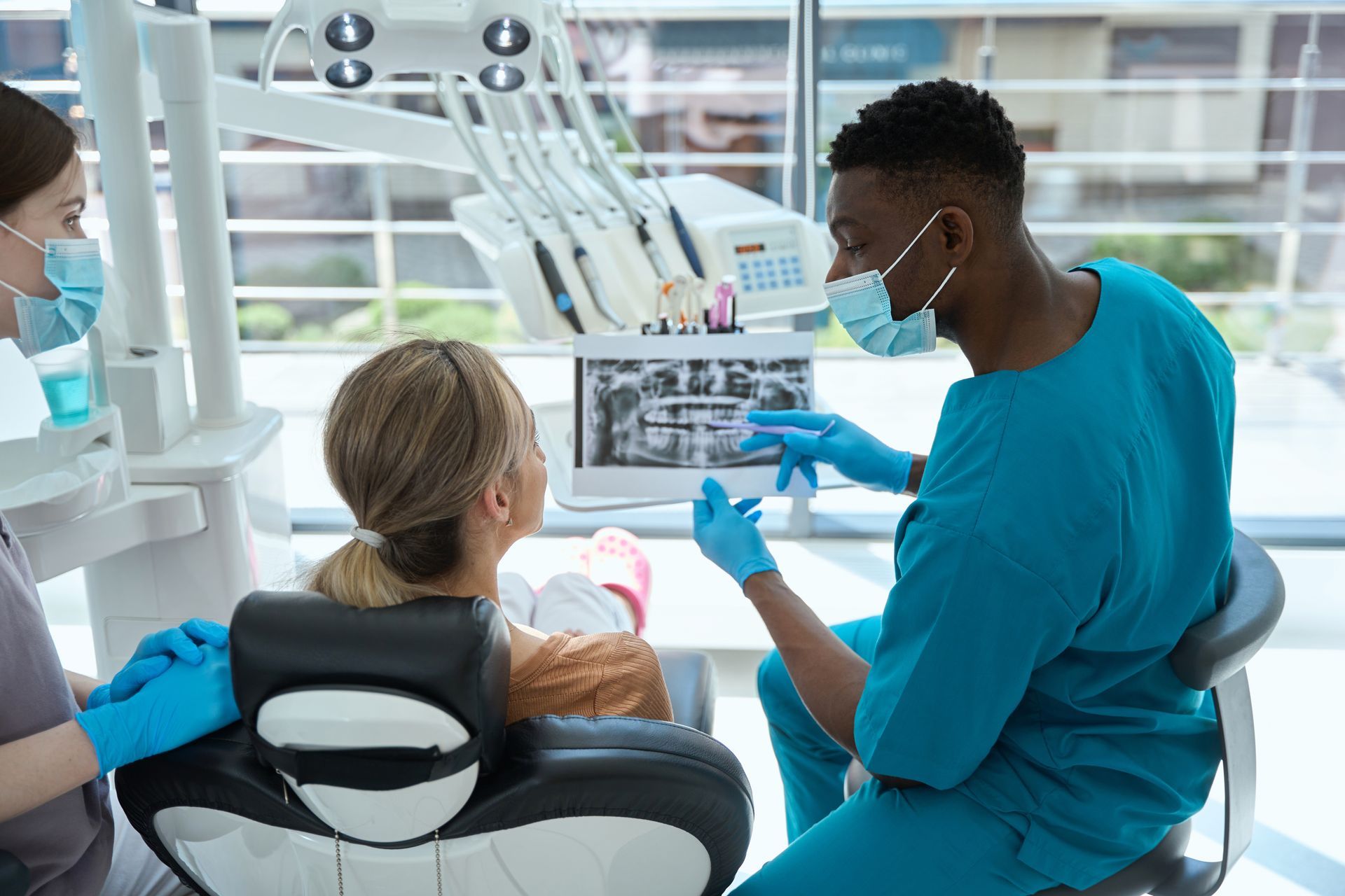 Physician and patient discussing coverage options, supplemental insurance consultation