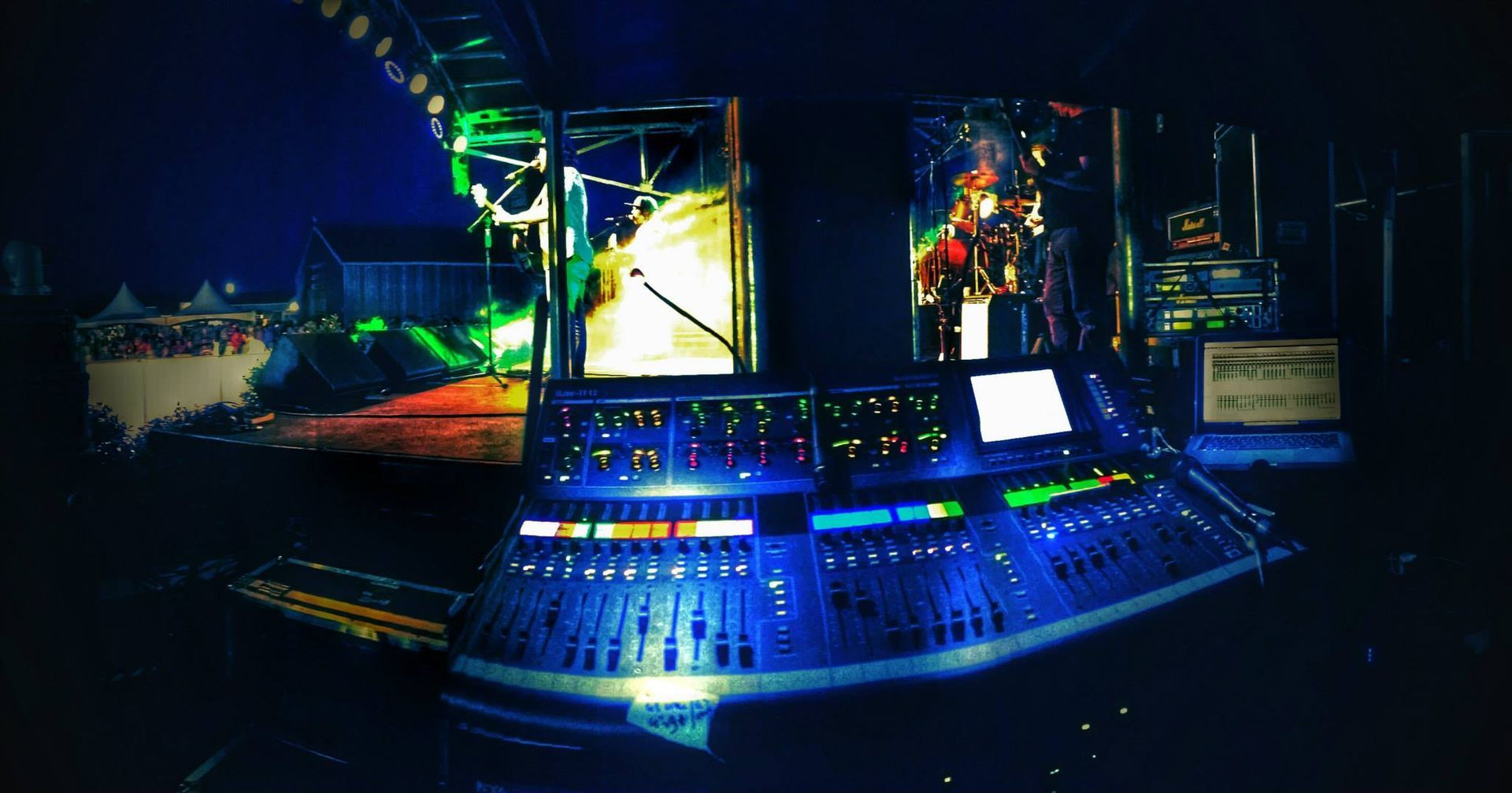 Sound Mixing Console At A Concert. Blue Lights Illuminate The Equipment — Kennedy Amplifier Hire Service In South Mackay, QLD