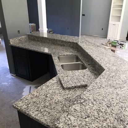 Black Or Very Dark Brown Kitchen Remodel by Custom Granite Interiors project photo