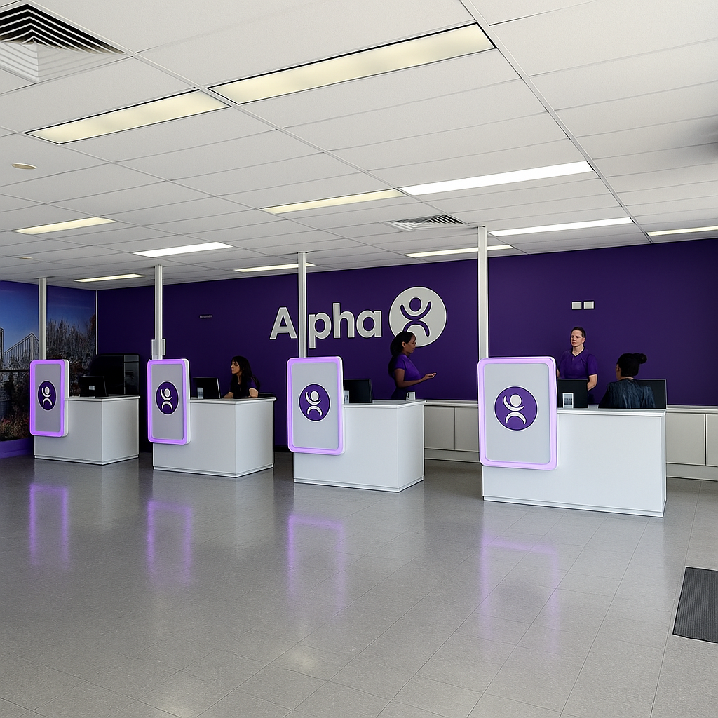 Inside Alpha store: four service counters, purple accents, employees assisting customers.