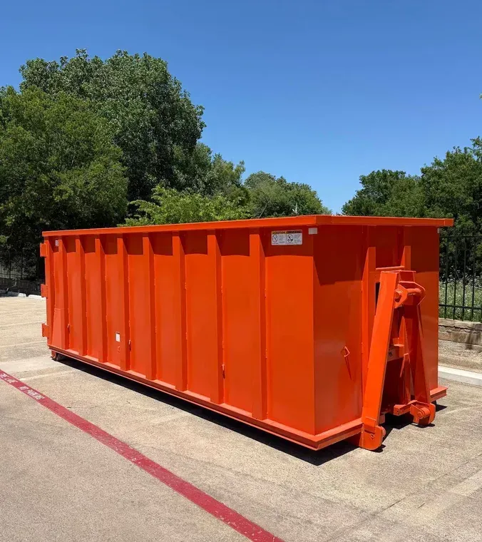 Roll off dumpster placed on a residential driveway in Fort Worth, TX