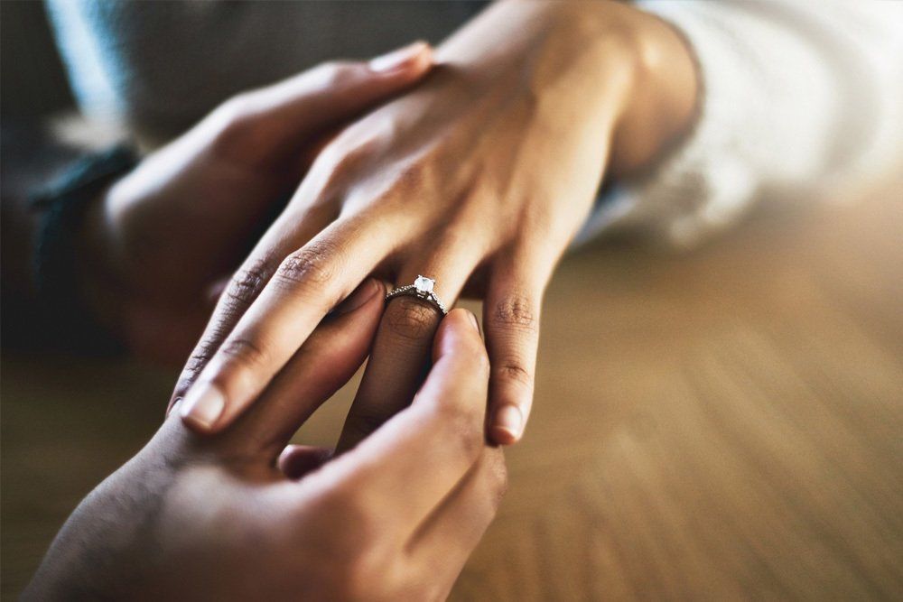Putting Engagement Ring On The Finger — Canowindra, NSW — Sage Civil Ceremonies Putting Engagement Ring On The Finger — Canowindra, NSW — Sage Civil Ceremonies