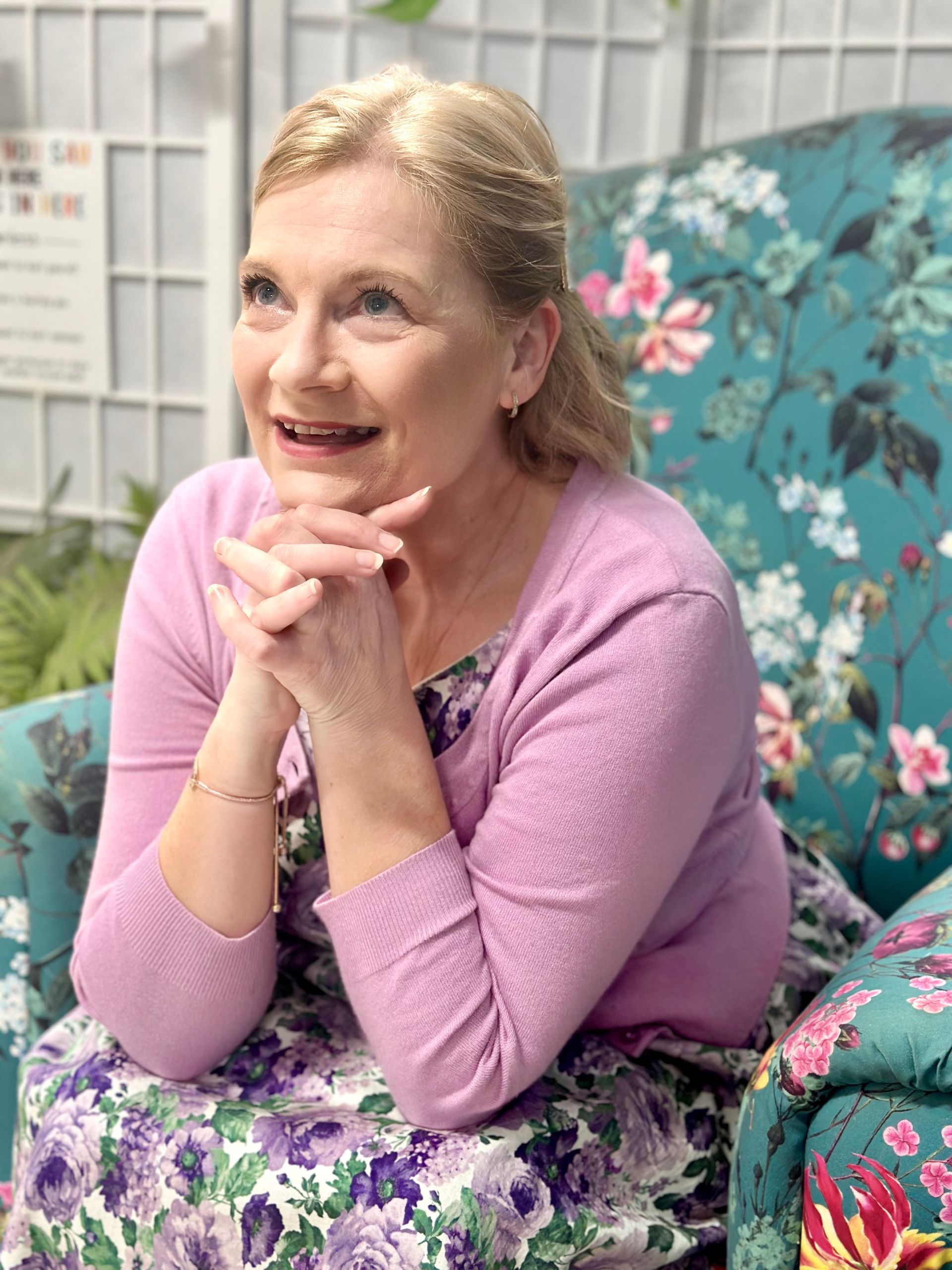 Carol-Anne in a beautiful amchair— The Red Chair Therapy in Blackwall, NSW