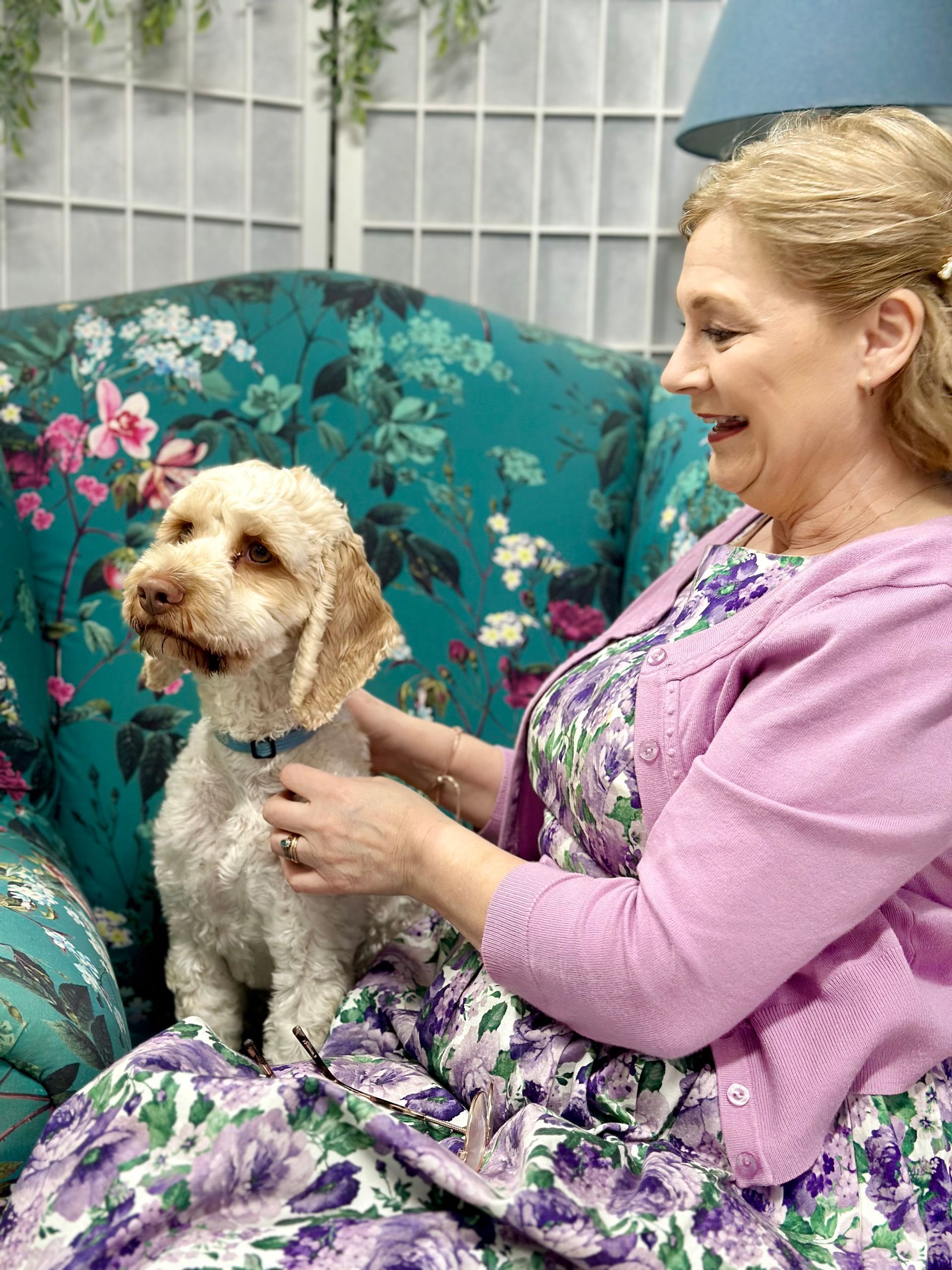 A Man Is Sitting On A Couch Talking To A Woman — The Red Chair Therapy in Blackwall, NSW