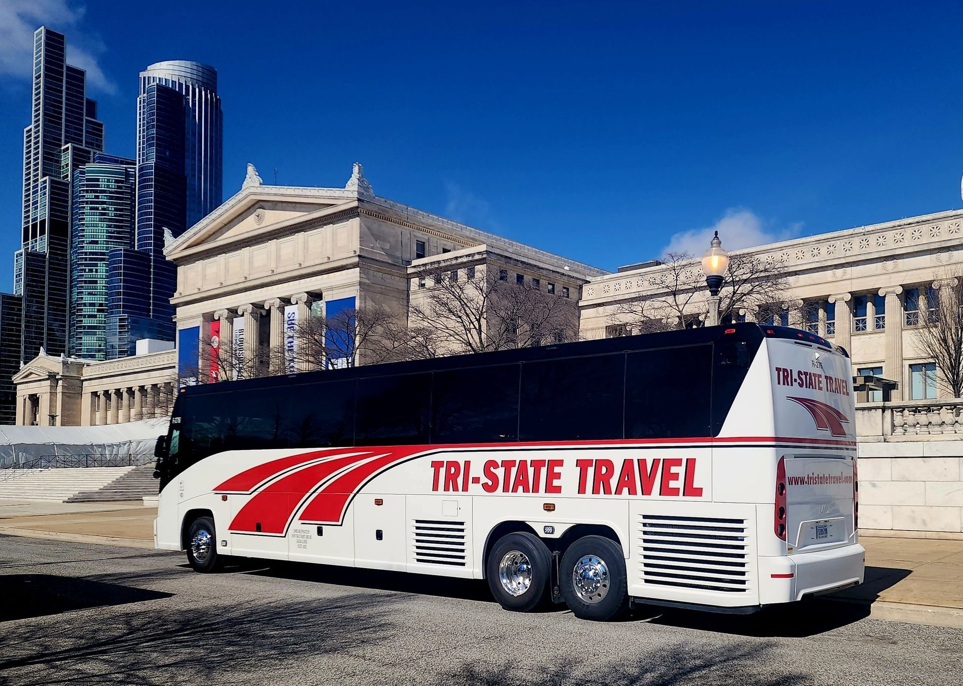 White tour bus labeled