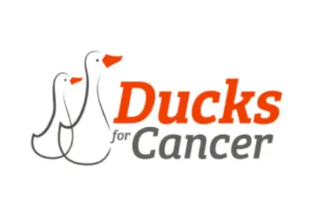 Ducks for Cancer logo with two white ducks and orange text on a white background