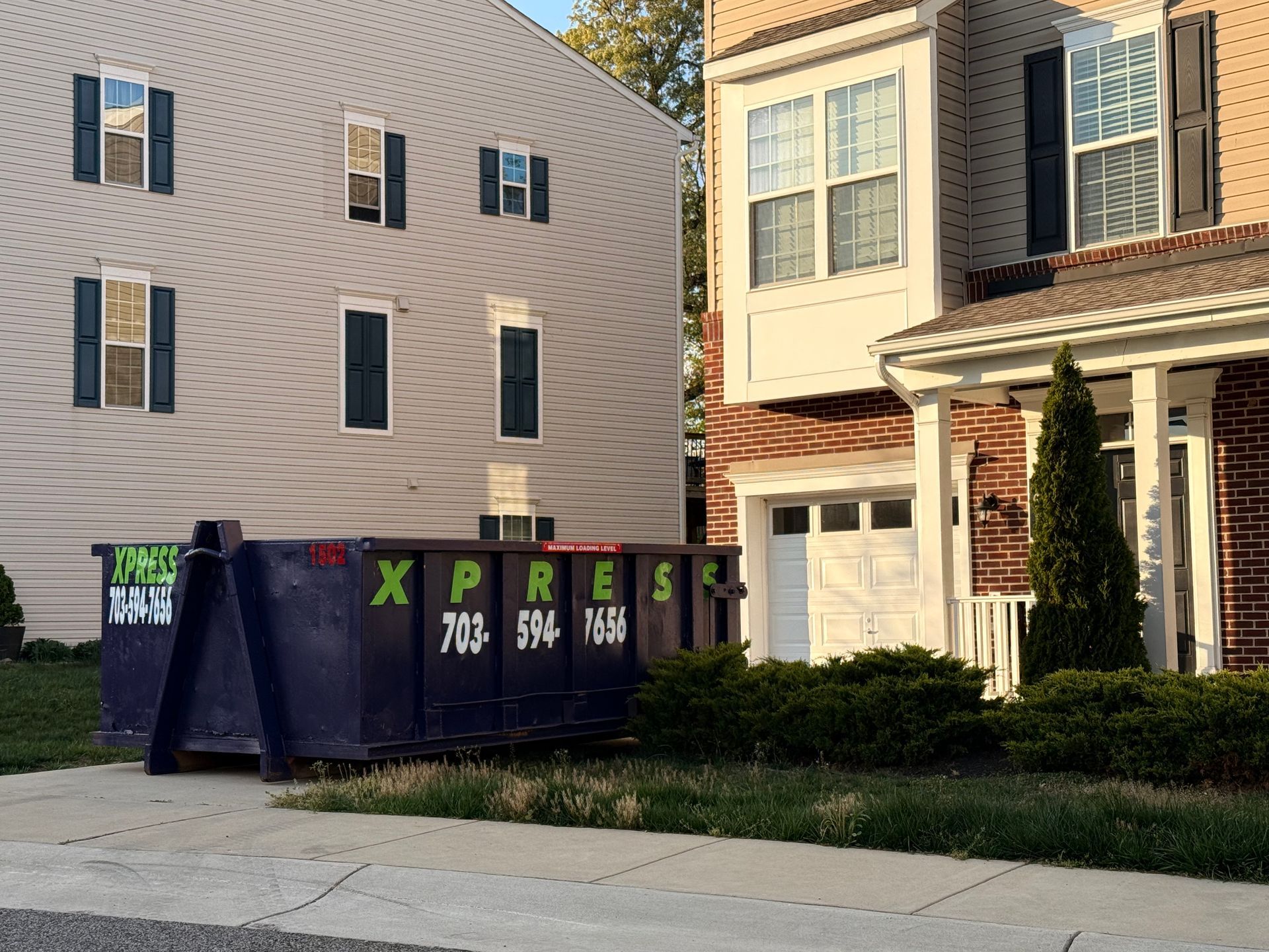 roll off dumpster rental in Northern Virginia driveway placement