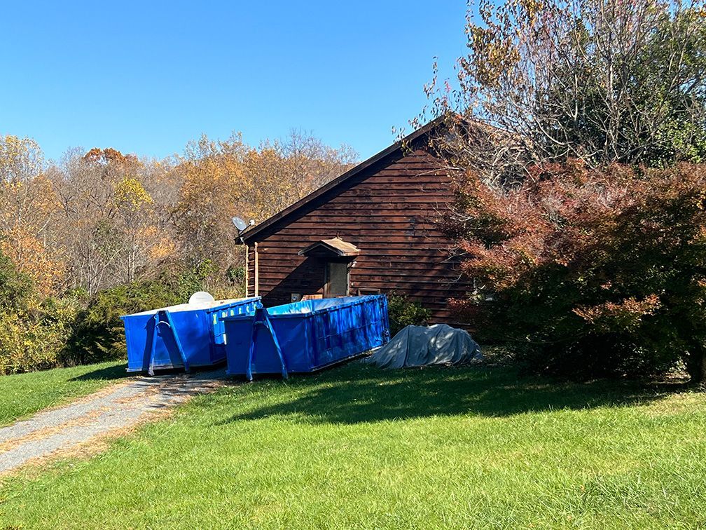 Roll-off dumpster rental delivered to rural farm property in Lignum Culpeper County VA